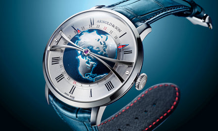 Luxury wristwatch with a 3D globe on the dial, blue leather strap, and silver hour markers.