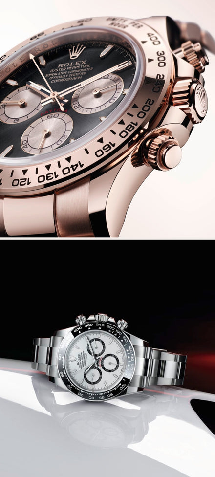 Close-up of two Rolex Daytona watches, one in rose gold with a black dial and one in silver with a white dial.