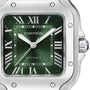 Close-up of the Cartier Santos de Cartier watch featuring a green square dial, silver Roman numerals and hands, stainless steel case with visible screws, and a blue cabochon crown—a tribute to aviation heritage.