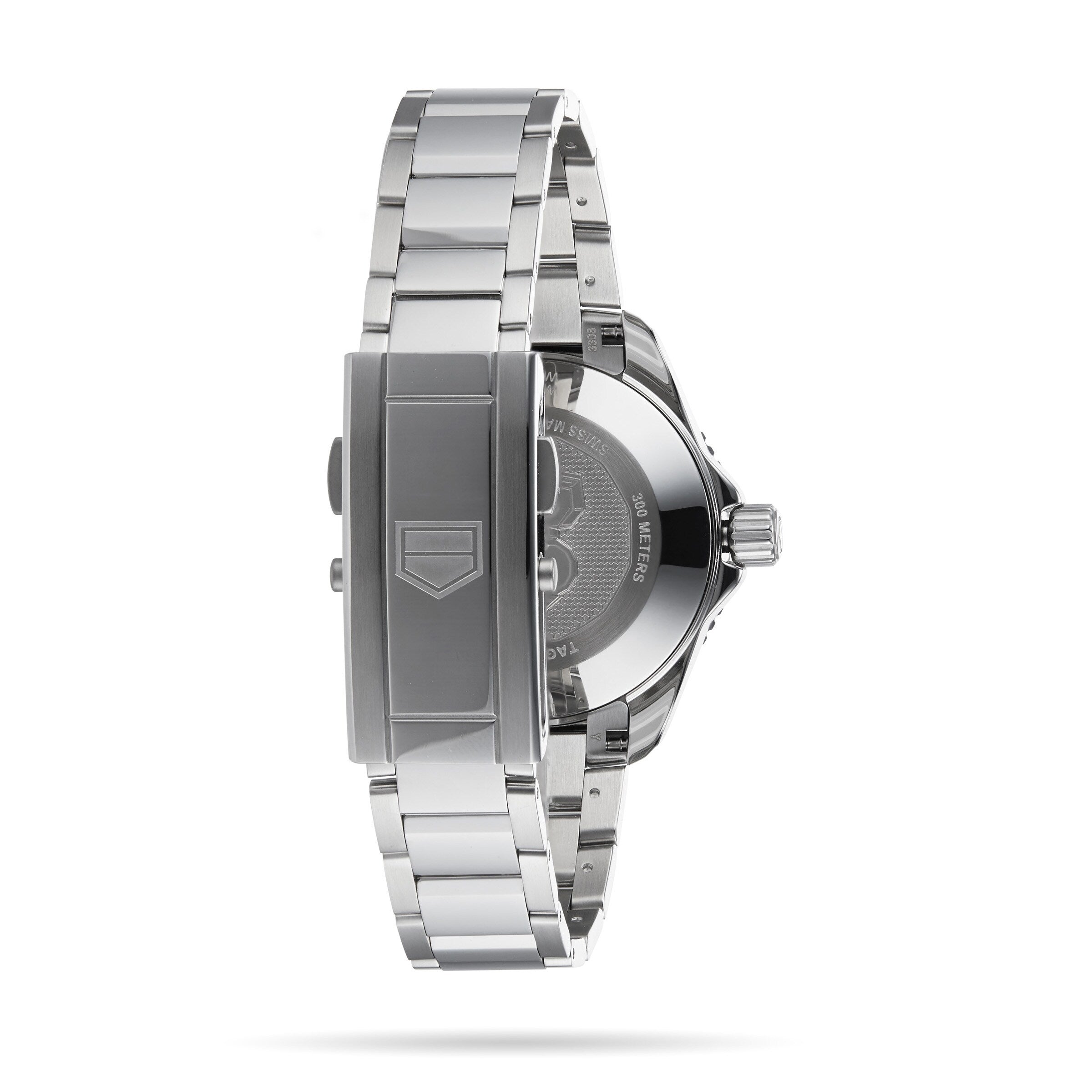 A TAG Heuer Aquaracer Professional 300 Date wristwatch shown from the back, featuring its stainless steel bracelet and clasp, with engraving visible on the dive watchs case back.