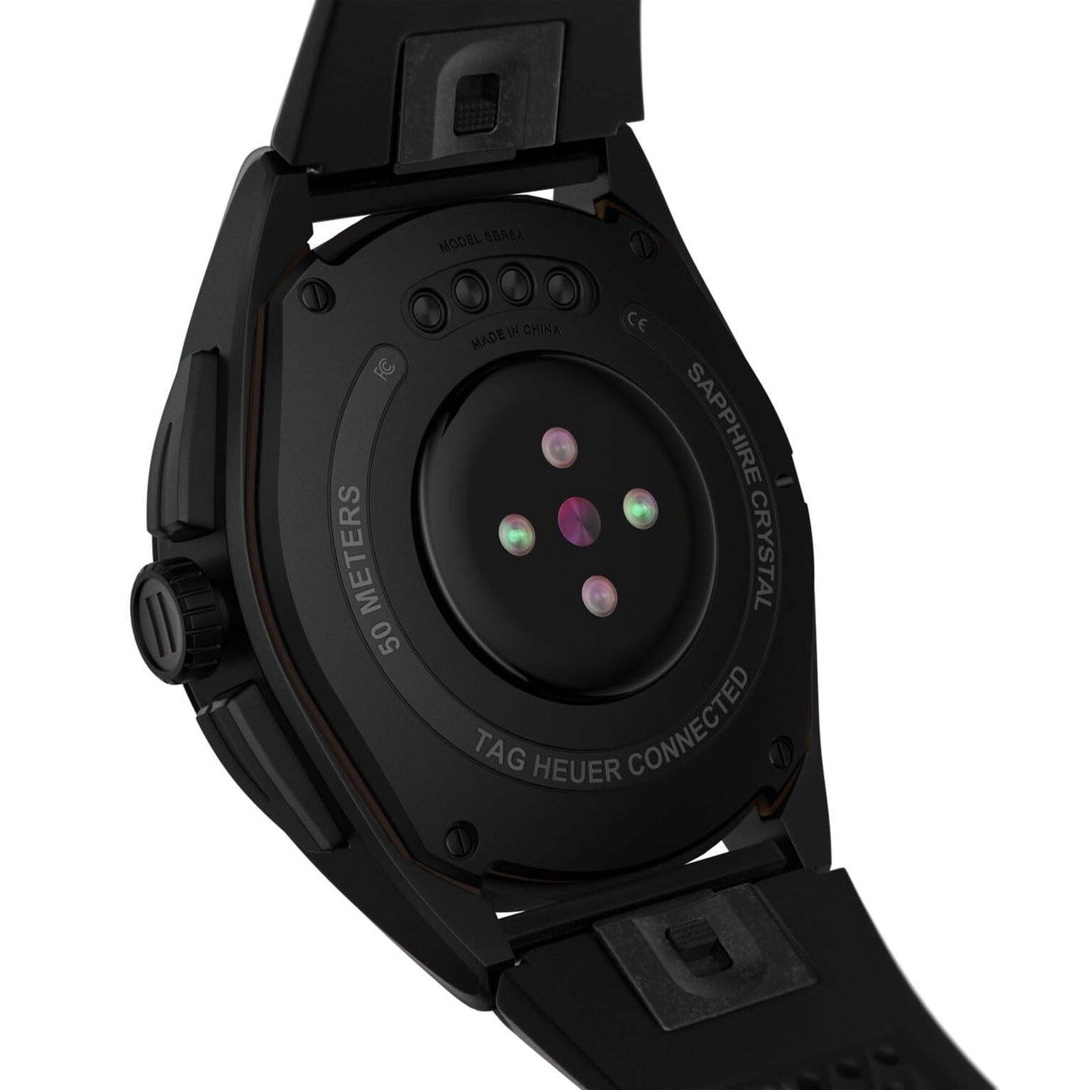 Close-up of the Connected Calibre E4 by TAG Heuer, showcasing its sensor array on the back, titanium case, and rubber strap.