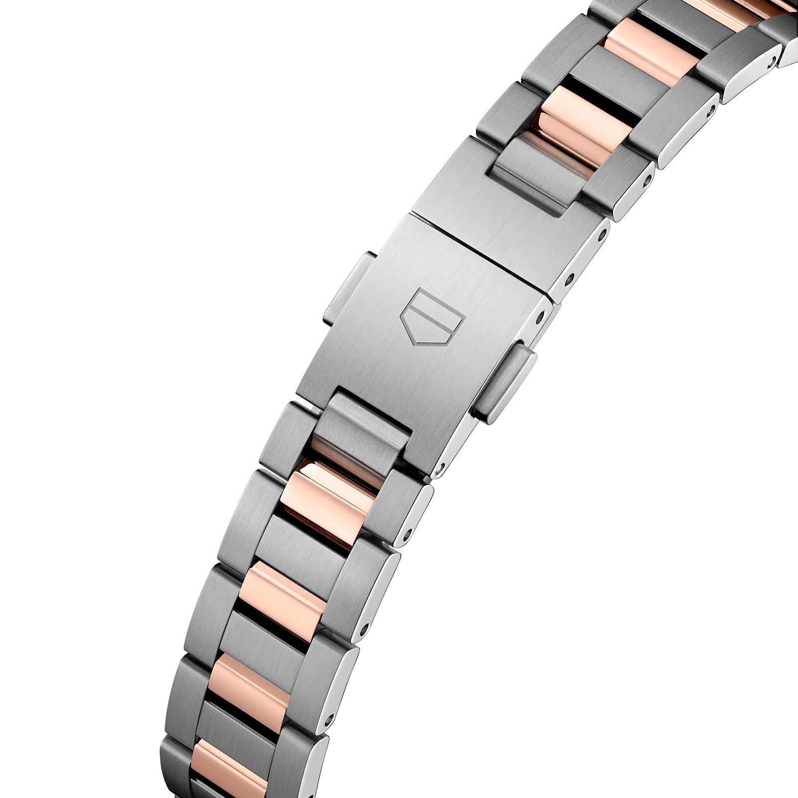 Close-up of the TAG Heuer Carrera Dates two-tone metal bracelet with alternating silver and rose gold links, featuring a clasp engraved with the TAG Heuer shield logo.