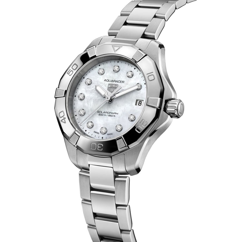 The TAG Heuer Aquaracer 200 Professional Solargraph features a stainless steel case, white mother-of-pearl dial with diamond hour markers, date display, and a unidirectional rotating bezel.
