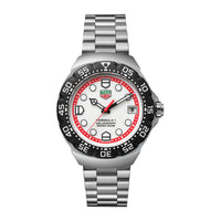 The TAG Heuer Formula 1 Solargraph is a silver watch featuring a white and red dial, black bezel, and metal bracelet.