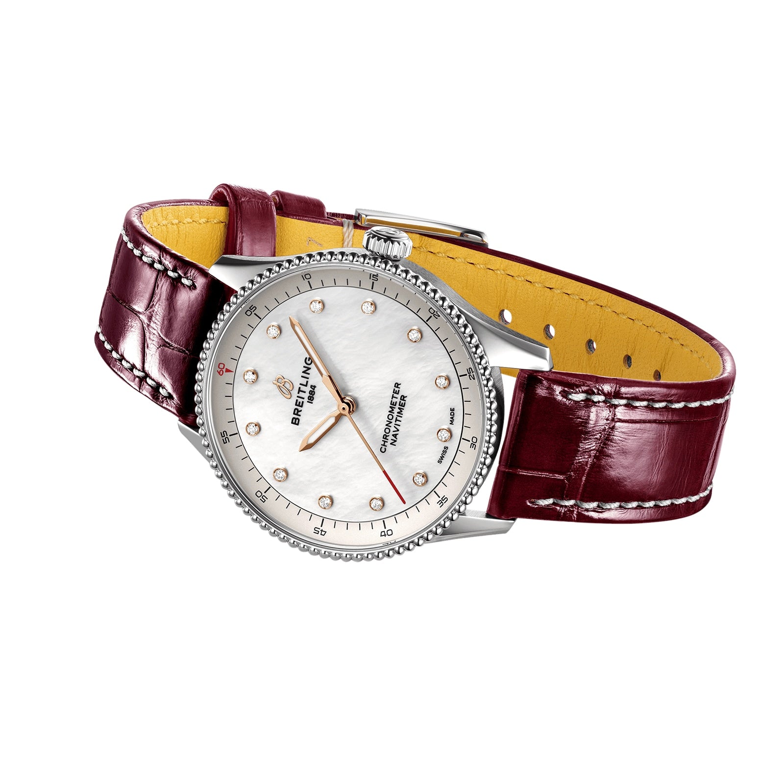 The Breitling Navitimer 32 features a mother-of-pearl dial, diamond hour markers, silver case, burgundy leather strap, and runs on the high-precision Breitling Calibre 77 SuperQuartz™ movement.