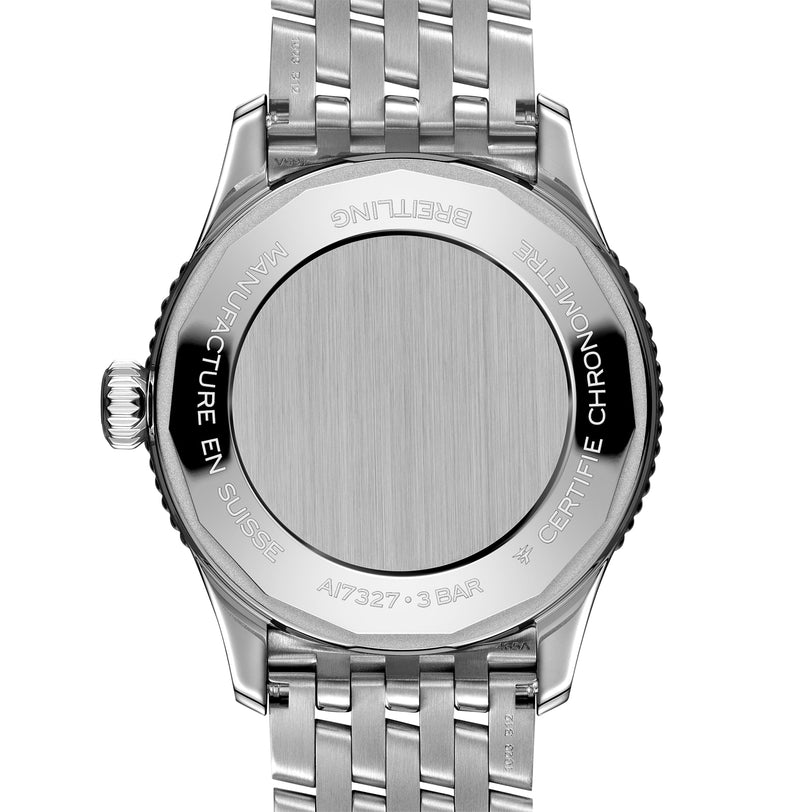 Back view of the Breitling Navitimer Automatic 36 in stainless steel, featuring an engraved case back, signature Navitimer detailing, and a matching metal bracelet.