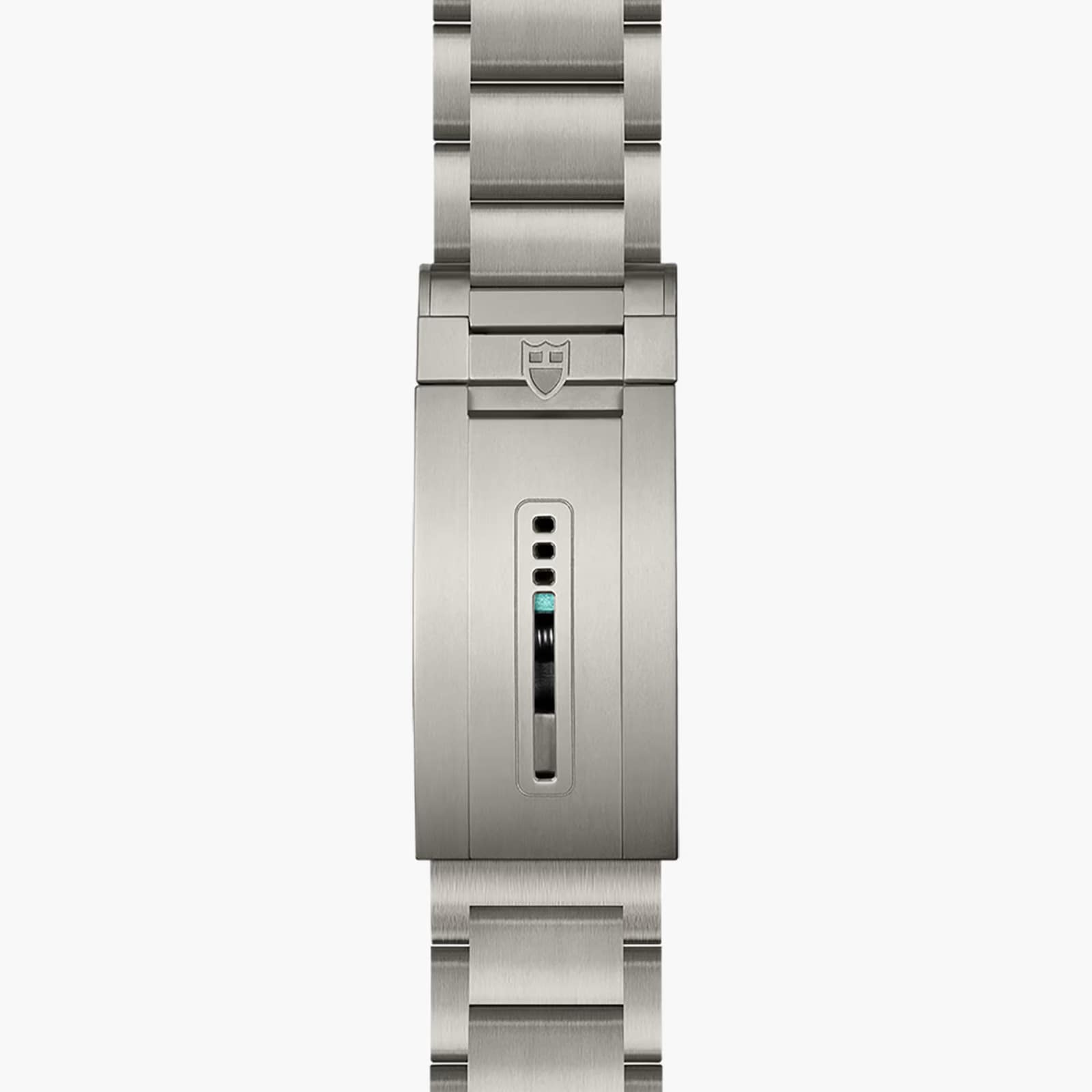 A close-up of the TUDOR Pelagos Ultras stainless steel bracelet clasp, featuring a small rectangular adjustment window.