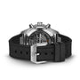 The back view of the IWC Schaffhausen Pilots Watch Performance Chronograph 41 AMG shows its automatic movement through sapphire glass, with a black rubber strap and a stainless steel buckle engraved with IWC.