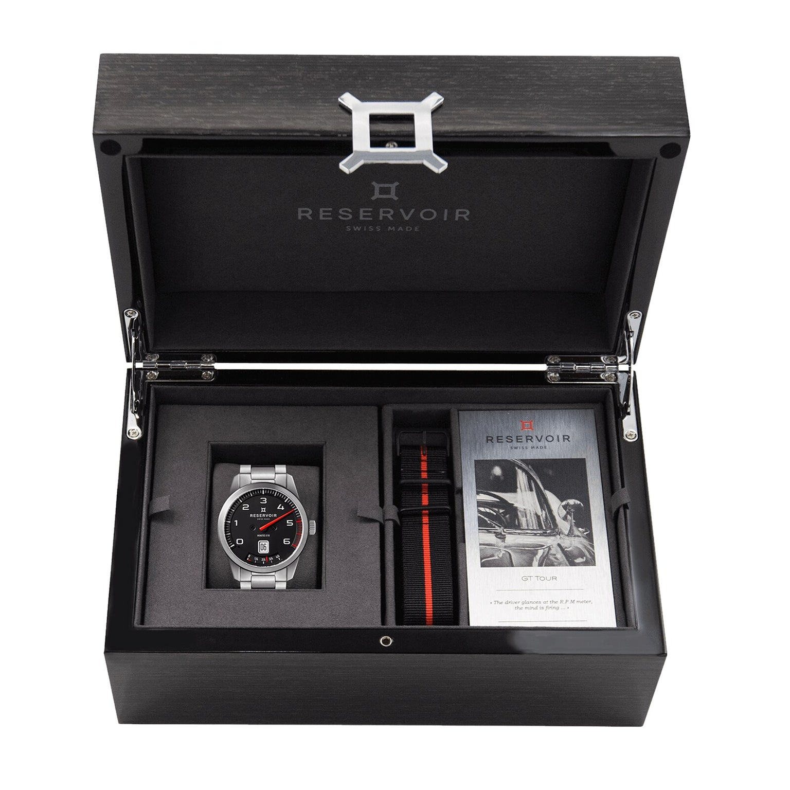 The Reservoir GT Tour luxury watch gift set includes a watch, extra strap, and instruction booklet, all elegantly presented in a black box.