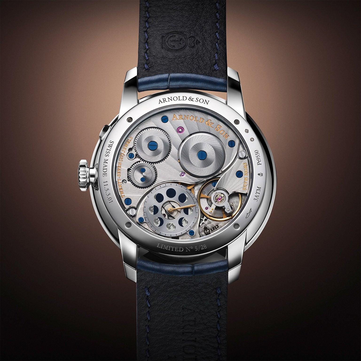 Close-up of the Arnold & Son Perpetual Moon 41.5mm Platinum showcasing its exposed mechanical movement, intricate gears, and elegant leather strap.